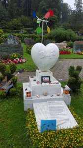 Grave of a young boy who died just a few days after his 10th birthday.